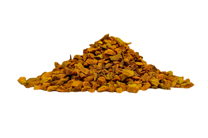 Pile of bright orange-yellow turmeric powder (Curcuma longa) on white background